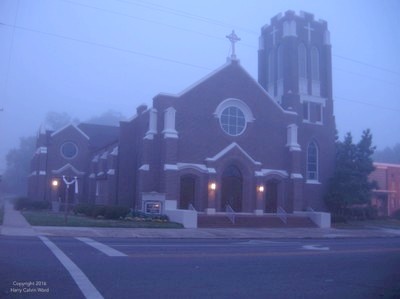 A church on a foggy morning