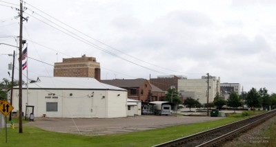 The VFW building in the foreground and taller buildings in the distance