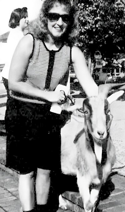 A woman and her pet goat