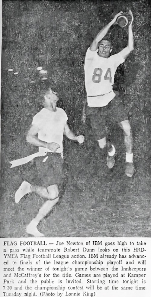 Two men playing flag football