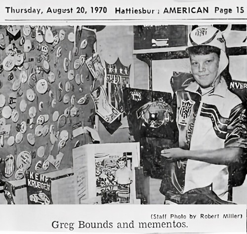 Gregg Bounds poses with his mementos